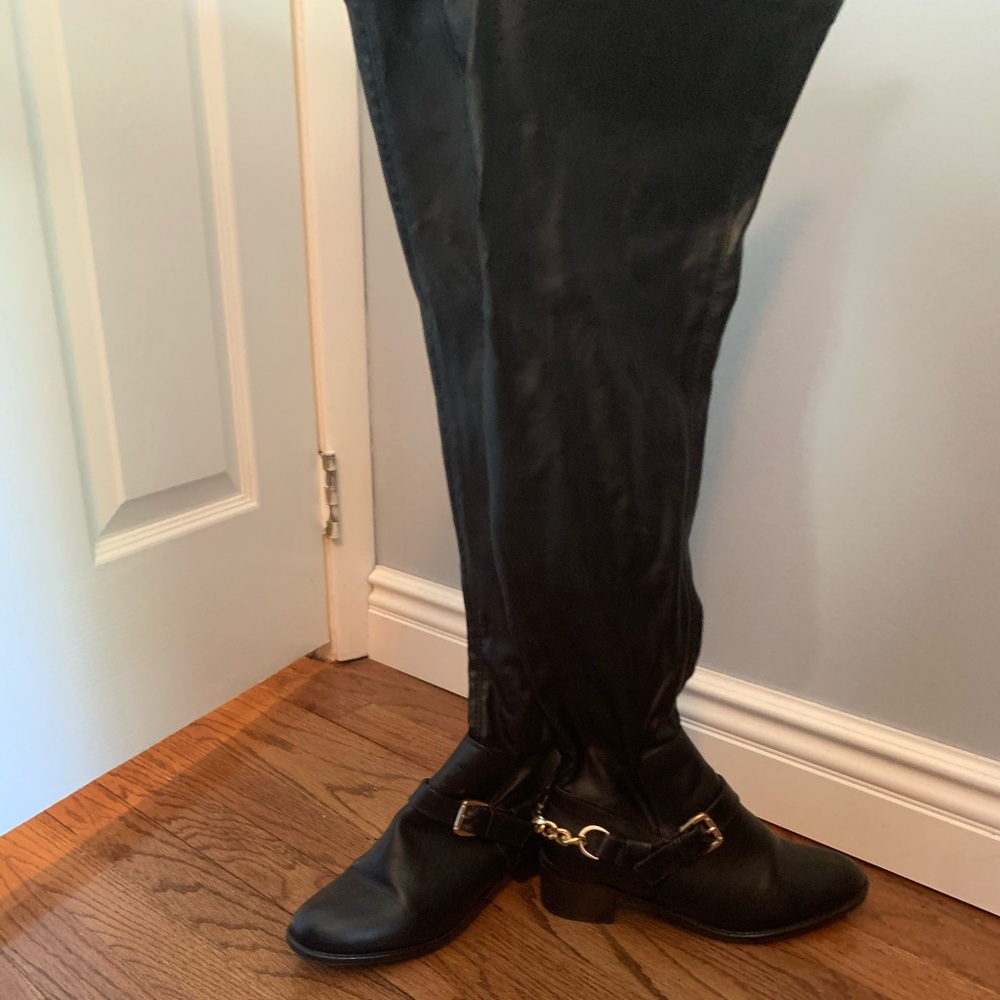 Black thigh high leather boots